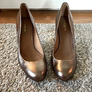 Bronze Coach round toed heels, size 7.5